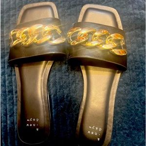 Black sandals with gold chain size 8